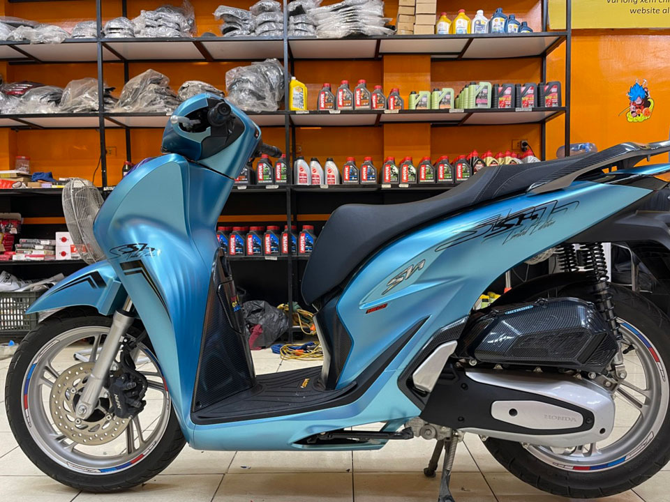 dán xe sh xanh ngọc